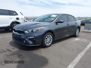 2021 Kia Forte LXS z VIN 3KPF24AD0ME300230, wystawiony jako IAAI lot #42373994 z przebiegiem 60 823 mil mil oraz . Historia ofert i sprzedaży dostępna na DreamBid. Obrazek 2.