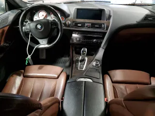 2013 BMW 6 Series 650i xDrive z VIN WBA6B4C56DD098658, wystawiony jako Copart lot #55408535 z przebiegiem 72 964 mil mil oraz Szkoda całkowita • Salvage title. Historia ofert i sprzedaży dostępna na DreamBid. Obrazek 8.