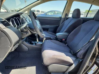 2011 Nissan Versa S with VIN 3N1BC1CP1BL457889, listed as a Copart auction lot 63414385 with 120,303 mi miles and Salvage title. Bid and sale history available at DreamBid. Image 7.