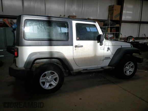 2011 Jeep Wrangler Sport with VIN 1J4AA2D12BL555530, listed as a Copart auction lot 42049915 with 83,349 mi miles and Salvage Title. Bid and sale history available at carsss.com. Image 3.