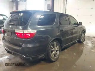 2013 Dodge Durango R/T z VIN 1C4SDJCT2DC662269, wystawiony jako IAAI lot #41602661 z przebiegiem 180 014 mil mil oraz . Historia ofert i sprzedaży dostępna na DreamBid. Obrazek 4.