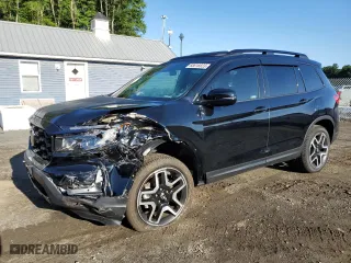 2023 Honda Passport Elite with VIN 5FNYF8H00PB014366, listed as a Copart auction lot 68616923 with 5,026 mi miles. Bid and sale history available at carsss.com. Image 1.