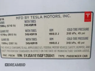 2016 Tesla Model S 70 kWh Battery with VIN 5YJSA1E15GF135841, listed as a IAAI auction lot 41846535 with 87,312 mi miles. Bid and sale history available at carsss.com. Image 9.