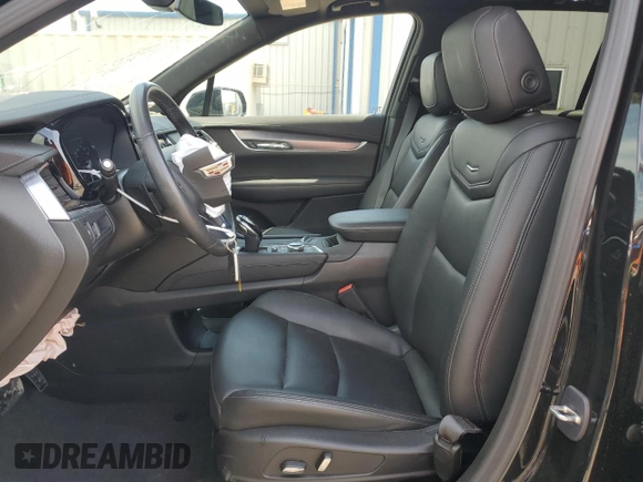 2023 Cadillac XT6 FWD Luxury z VIN 1GYKPAR45PZ187400, wystawiony jako Copart lot #54562335 z przebiegiem 16 953 mil mil oraz Szkoda całkowita • Salvage title. Historia ofert i sprzedaży dostępna na DreamBid. Obrazek 7.