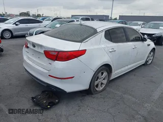 2015 Kia Optima LX with VIN KNAGM4A70F5644189, listed as a IAAI auction lot 42141090 with 140,346 mi miles. Bid and sale history available at carsss.com. Image 4.