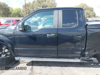 2018 Ford F-150 XL with VIN 1FTEX1CP8JKF28410, listed as a IAAI auction lot 40678411 with 64,138 mi miles and . Bid and sale history available at DreamBid. Image 14.