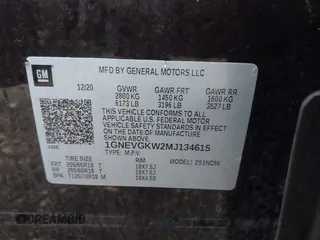 2021 Chevrolet Traverse LT Cloth with VIN 1GNEVGKW2MJ134615, listed as a IAAI auction lot 41667174 with 52,717 mi miles. Bid and sale history available at carsss.com. Image 9.