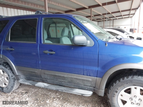2006 Ford Escape XLT with VIN 1FMYU03166KC05651, listed as a IAAI auction lot 41799174 with 114,594 mi miles. Bid and sale history available at carsss.com. Image 13.