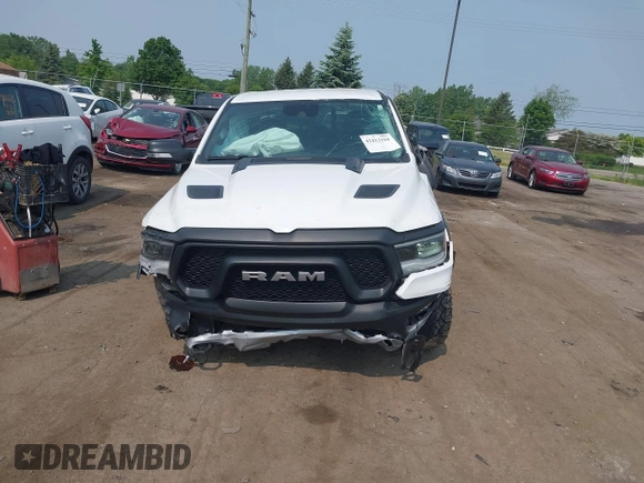 2022 Ram 1500 Rebel with VIN 1C6SRFLT5NN318494, listed as a IAAI auction lot 42413194 with 59,458 mi miles and . Bid and sale history available at DreamBid. Image 12.