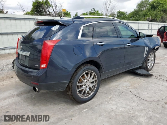 2014 Cadillac SRX Performance Collection с VIN 3GYFNCE34ES580069, выставлен на аукционе Copart как лот 60662415 с пробегом 141 107 миль миль и Списание • Salvage title. История ставок и продаж доступна на DreamBid. Изображение 3.