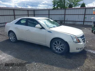 2009 Cadillac CTS AWD z VIN 1G6DT57V090104530, wystawiony jako IAAI lot #42314043 z przebiegiem 96 109 mil mil oraz . Historia ofert i sprzedaży dostępna na DreamBid. Obrazek 1.