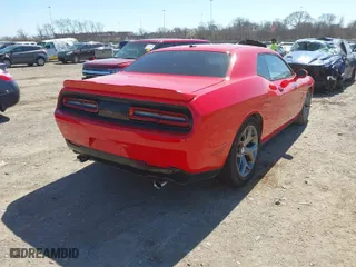 2015 Dodge Challenger R/T with VIN 2C3CDZAT7FH809339, listed as a IAAI auction lot 41771707 with 125,292 mi miles. Bid and sale history available at carsss.com. Image 3.