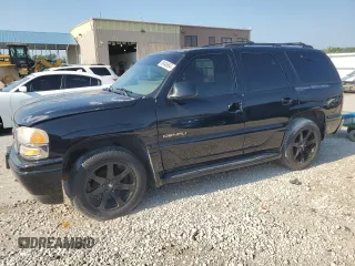 2001 GMC Yukon Denali z VIN 1GKEK63U11J295918, wystawiony jako Copart lot #58448654 z przebiegiem Nie podano mil oraz Szkoda całkowita • Salvage title. Historia ofert i sprzedaży dostępna na DreamBid. Obrazek 1.