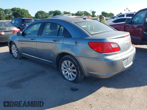 2010 Chrysler Sebring Limited with VIN 1C3CC5FD6AN190813, listed as a IAAI auction lot 42228345 with 113,512 mi miles and . Bid and sale history available at DreamBid. Image 3.