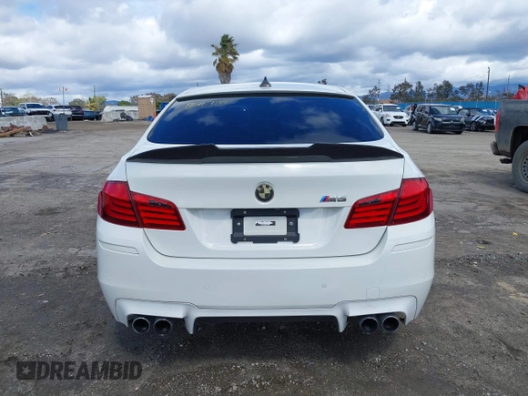 2013 BMW M5 with VIN WBSFV9C56DC772961, listed as a IAAI auction lot 41765457 with 104,568 mi miles. Bid and sale history available at carsss.com. Image 16.