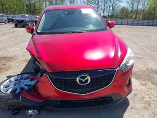 2015 Mazda CX-5 Grand Touring with VIN JM3KE4DY5F0469439, listed as a IAAI auction lot 42053851 with 70,676 mi miles. Bid and sale history available at carsss.com. Image 12.