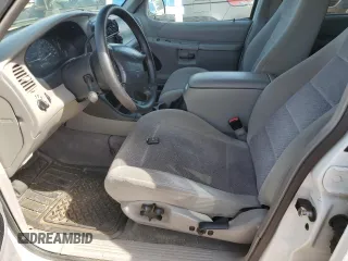 1999 Ford Explorer XLT with VIN 1FMZU34E2XZA06337, listed as a Copart auction lot 45536845 with 170,605 mi miles and Salvage title. Bid and sale history available at DreamBid. Image 7.