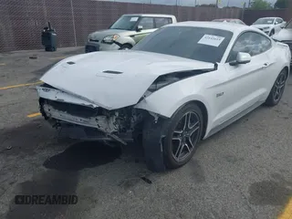 2021 Ford Mustang GT with VIN 1FA6P8CF5M5115597, listed as a IAAI auction lot 42142619 with 101,687 mi miles and . Bid and sale history available at DreamBid. Image 16.