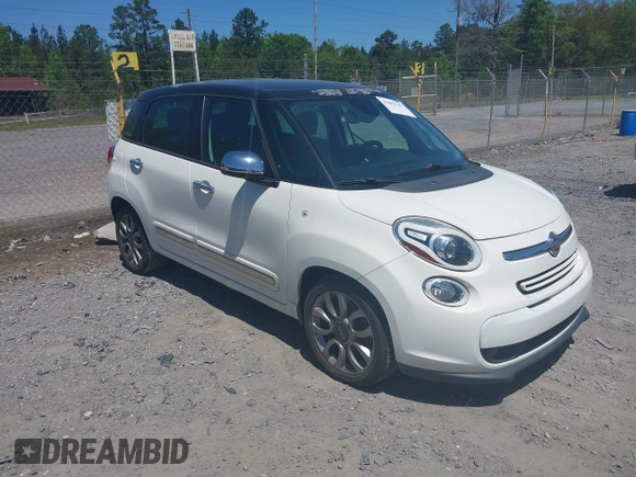 2014 FIAT 500L Lounge with VIN ZFBCFACH8EZ005469, listed as a IAAI auction lot 42002547 with 114,769 mi miles. Bid and sale history available at carsss.com. Image 1.