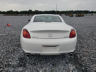 2003 Lexus SC 430 with VIN JTHFN48Y030045309, listed as a Copart auction lot 59034585 with 104,167 mi miles and Salvage title. Bid and sale history available at DreamBid. Image 6.