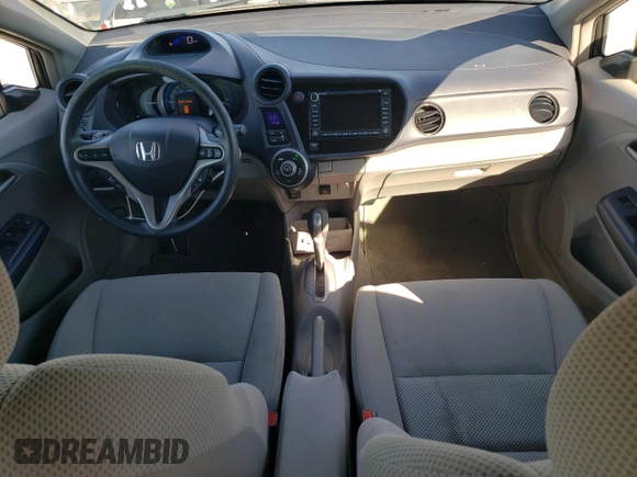 2010 Honda Insight EX with VIN JHMZE2H73AS039935, listed as a Copart auction lot 46192575 with 127,329 mi miles and Salvage Title. Bid and sale history available at DreamBid. Image 8.
