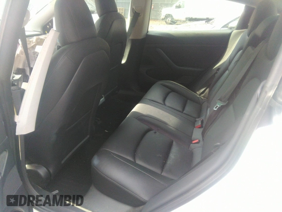 2020 Tesla Model 3 Standard Range Plus with VIN 5YJ3E1EA4LF792830, listed as a IAAI auction lot 41852919 with 76,461 mi miles. Bid and sale history available at carsss.com. Image 8.