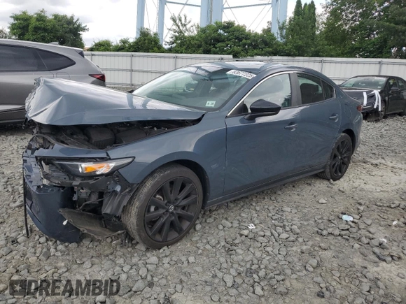 2023 Mazda 3 S Carbon Edition with VIN 3MZBPACM0PM365128, listed as a Copart auction lot 63677225 with Not provided miles and Salvage title. Bid and sale history available at DreamBid. Image 1.