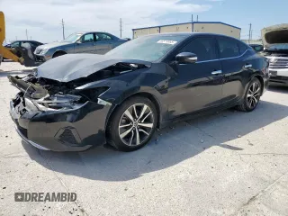 2021 Nissan Maxima SV с VIN 1N4AA6CV7MC511890, выставлен на аукционе Copart как лот 56579865 с пробегом 82 752 миль миль и Списание • Salvage title. История ставок и продаж доступна на DreamBid. Изображение 1.