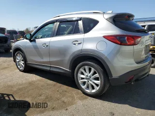 2014 Mazda CX-5 Grand Touring with VIN JM3KE4DY4E0305212, listed as a Copart auction lot 53145305 with 233,061 mi miles and Salvage Title. Bid and sale history available at carsss.com. Image 2.