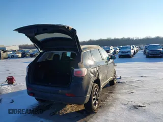 2018 Jeep Compass Trailhawk with VIN 3C4NJDDB4JT501774, listed as a IAAI auction lot 41537713 with 50,834 mi miles and . Bid and sale history available at carsss.com. Image 4.