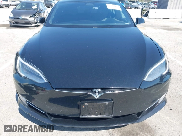 2017 Tesla Model S 100D with VIN 5YJSA1E21HF202591, listed as a IAAI auction lot 41983073 with 140,282 mi miles and . Bid and sale history available at DreamBid. Image 12.