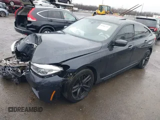 2018 BMW 6 Series 640i xDrive with VIN WBAJV6C55JBK07051, listed as a IAAI auction lot 41505732 with 96,172 mi miles and . Bid and sale history available at carsss.com. Image 2.