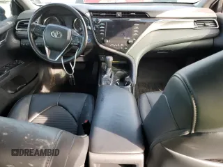 2019 Toyota Camry Hybrid LE z VIN 4T1B21HKXKU518106, wystawiony jako Copart lot #77074883 z przebiegiem 147 442 mil mil oraz Szkoda całkowita • Salvage title. Historia ofert i sprzedaży dostępna na DreamBid. Obrazek 8.