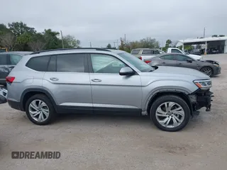 2021 Volkswagen Atlas SE with VIN 1V2JR2CA7MC556268, listed as a IAAI auction lot 41185525 with 73,724 mi miles and . Bid and sale history available at DreamBid. Image 14.