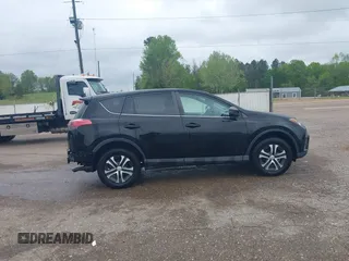 2018 Toyota RAV4 LE with VIN 2T3BFREV8JW777510, listed as a IAAI auction lot 41974675 with 62,795 mi miles. Bid and sale history available at carsss.com. Image 14.