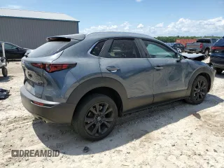 2022 Mazda CX-30 S Carbon Edition с VIN 3MVDMBCL0NM434395, выставлен на аукционе Copart как лот 56247715 с пробегом 40 698 миль миль и На запчасти • Non repairable. История ставок и продаж доступна на DreamBid. Изображение 3.