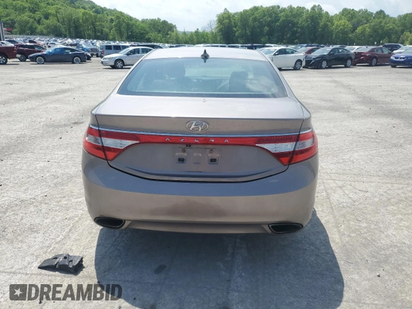 2013 Hyundai Azera z VIN KMHFG4JG4DA240690, wystawiony jako Copart lot #57465565 z przebiegiem 164 757 mil mil oraz Szkoda całkowita • Salvage title. Historia ofert i sprzedaży dostępna na DreamBid. Obrazek 6.