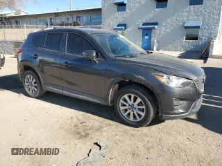 2016 Mazda CX-5 Sport with VIN JM3KE4BY3G0907976, listed as a Copart auction lot 85238414 with 92,933 mi miles and Salvage title. Bid and sale history available at DreamBid. Image 4.