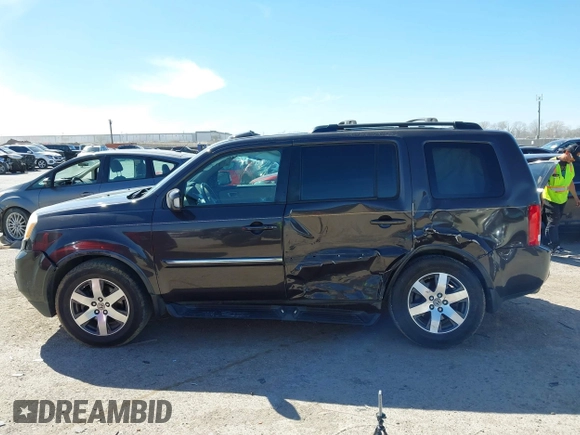 2012 Honda Pilot Touring with VIN 5FNYF4H99CB069996, listed as a IAAI auction lot 41809046 with 140,836 mi miles and . Bid and sale history available at DreamBid. Image 14.