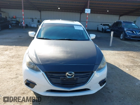 2014 Mazda 3 i Grand Touring with VIN JM1BM1M7XE1102093, listed as a IAAI auction lot 41344433 with 148,395 mi miles and . Bid and sale history available at DreamBid. Image 12.