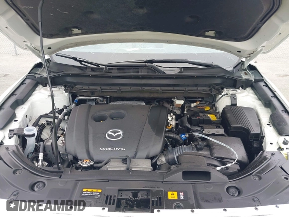 2023 Mazda CX-5 2.5 S Premium Package with VIN JM3KFBDM1P0126787, listed as a IAAI auction lot 41164586 with 12,076 mi miles. Bid and sale history available at carsss.com. Image 10.