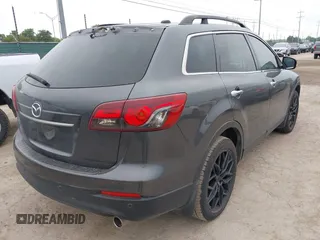 2013 Mazda CX-9 Grand Touring with VIN JM3TB2DA1D0401785, listed as a IAAI auction lot 42034331 with 128,146 mi miles and . Bid and sale history available at DreamBid. Image 4.