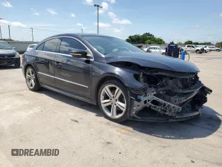 2014 Volkswagen CC R-Line with VIN WVWBP7AN0EE524850, listed as a Copart auction lot 52026104 with 92,196 mi miles and Salvage Title. Bid and sale history available at carsss.com. Image 4.