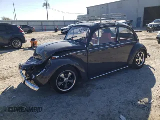 1967 Volkswagen Beetle with VIN 117142708, listed as a Copart auction lot 42380965 with 54,196 mi miles and Salvage Title. Bid and sale history available at DreamBid. Image 1.