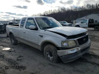 1999 Ford F-250 with VIN 1FTRX27L9XKA27324, listed as a Copart auction lot 87019484 with 152,787 mi miles and Salvage title. Bid and sale history available at DreamBid. Image 4.