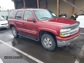 2002 Chevrolet Tahoe LT z VIN 1GNEK13Z02J202163, wystawiony jako IAAI lot #41739211 z przebiegiem 251 673 mil mil oraz . Historia ofert i sprzedaży dostępna na DreamBid. Obrazek 1.