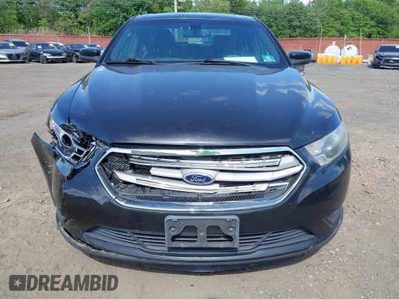 2015 Ford Taurus SEL with VIN 1FAHP2E88FG181055, listed as a IAAI auction lot 42307640 with 104,702 mi miles and . Bid and sale history available at DreamBid. Image 16.