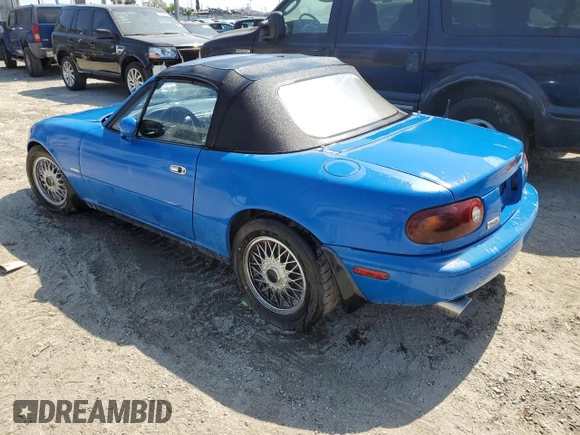1991 Mazda MX-5 Miata Special Edition z VIN JM1NA3510M1218378, wystawiony jako Copart lot #57149615 z przebiegiem 147 632 mil mil oraz Czysty tytuł • Clean title. Historia ofert i sprzedaży dostępna na DreamBid. Obrazek 2.