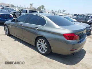2014 BMW 5 Series 535i xDrive with VIN WBA5B3C57ED531072, listed as a IAAI auction lot 42574991 with 104,304 mi miles and . Bid and sale history available at DreamBid. Image 3.