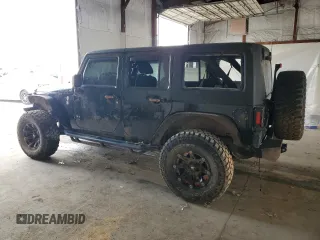 2012 Jeep Wrangler Unlimited Sahara with VIN 1C4BJWEG3CL195271, listed as a Copart auction lot 59947235 with 212,819 mi miles and Salvage title. Bid and sale history available at DreamBid. Image 2.